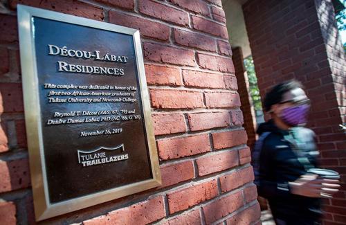 A plaque honoring Decou and Labat outside the Decou-Labat Residences