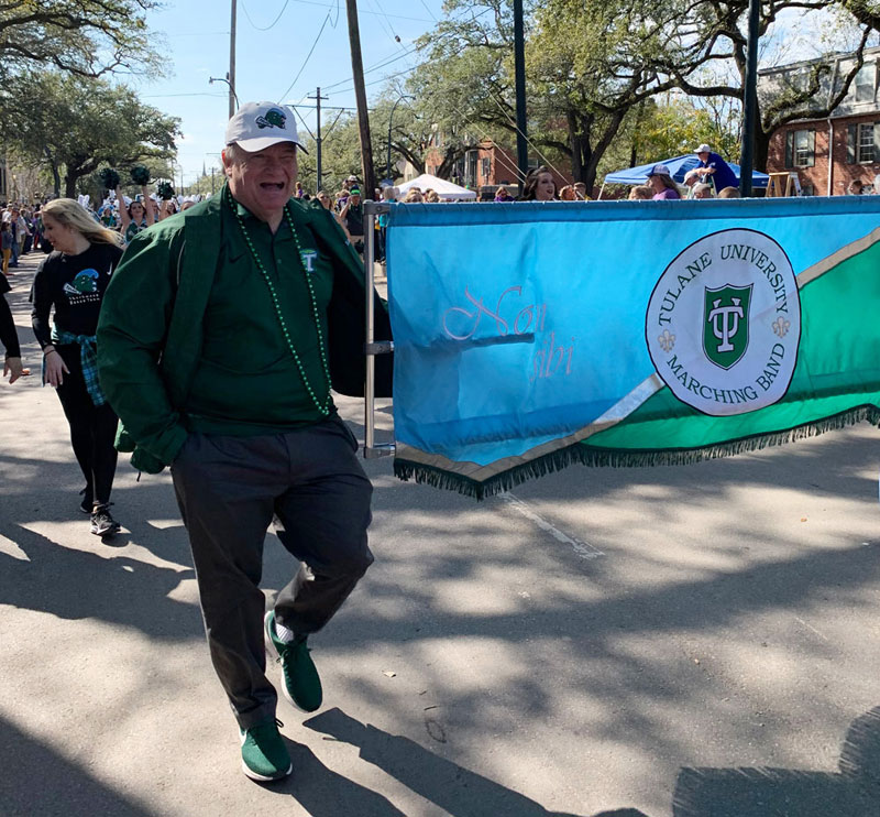 President Fitts marches with Tulane Marching Band